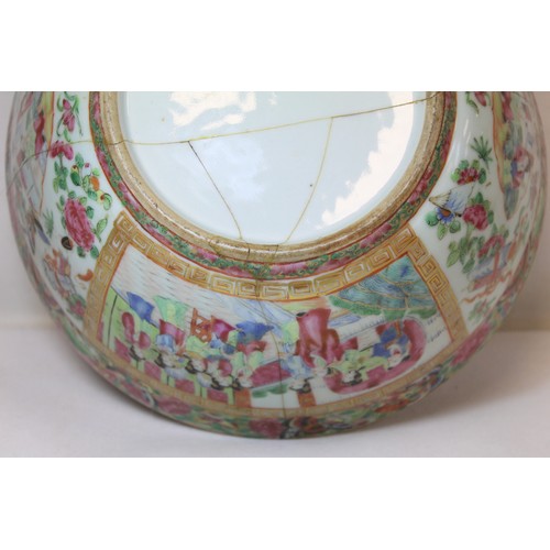 269 - 19th century Chinese Canton famille rose circular punch bowl, decorated with panels of figures on te... 