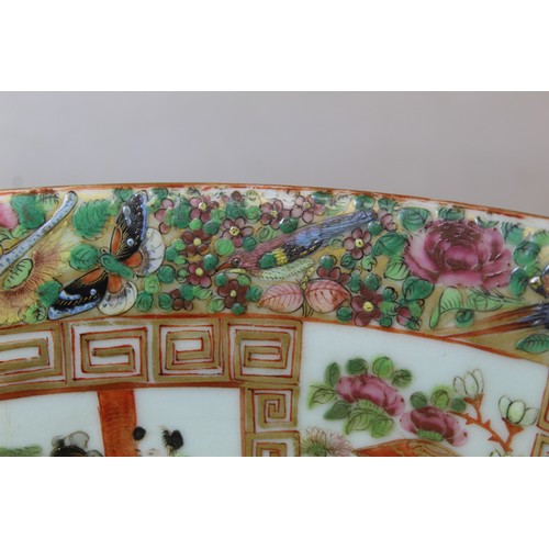 269 - 19th century Chinese Canton famille rose circular punch bowl, decorated with panels of figures on te... 