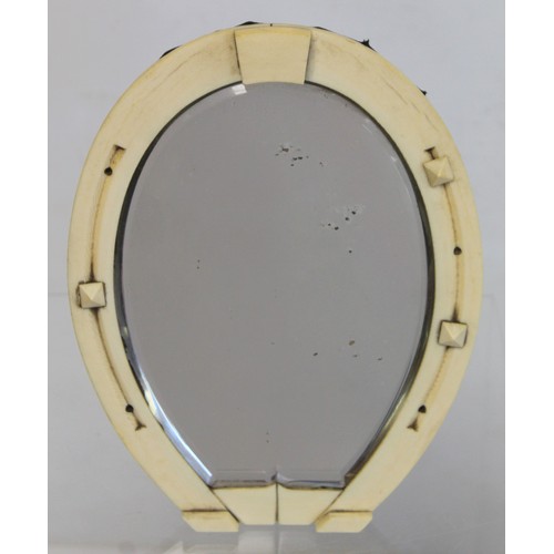 276 - Late 19th/early 20th century dressing table mirror with ivory frame in the form of a horseshoe, ease... 