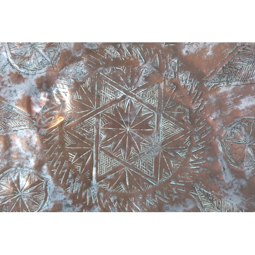 278 - 19th century large Eastern tinned copper circular charger with incised central flowerhead star medal... 