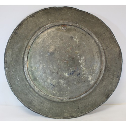 278 - 19th century large Eastern tinned copper circular charger with incised central flowerhead star medal... 