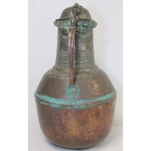 279 - 19th century large Middle Eastern or North African tinned beaten copper ewer of baluster form with s... 