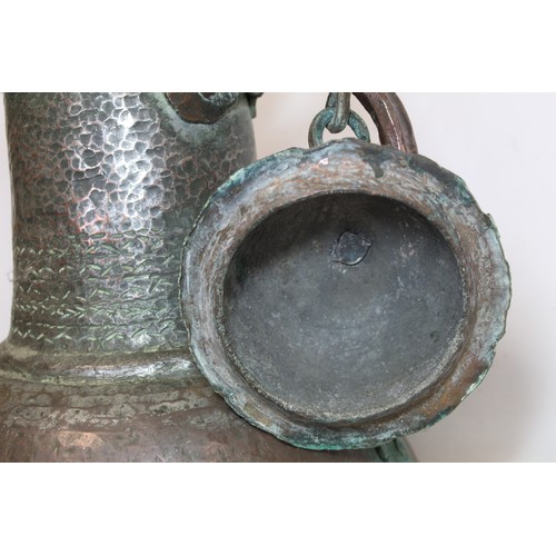 279 - 19th century large Middle Eastern or North African tinned beaten copper ewer of baluster form with s... 