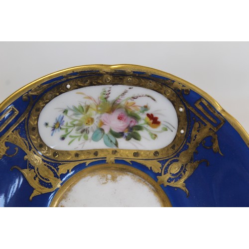 304 - Royal Worcester cabinet cup and saucer with polychrome painted floral panels surrounded by pink and ... 