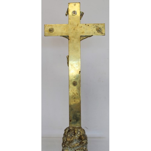 308 - 19th or early 20th century brass altar cross with figure of Christ and naturalistic rocky plinth bas... 