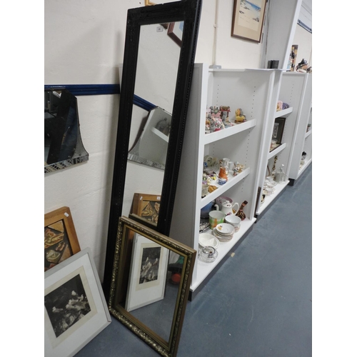 86 - Ebonised wall mirror and a gilt wall mirror.