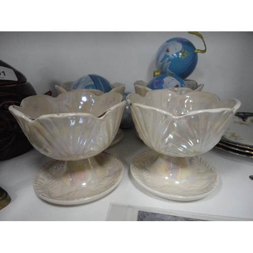 96 - Novelty jar and cover, sugar dispenser modelled as an apple, four sundae dishes, china plates, novel... 