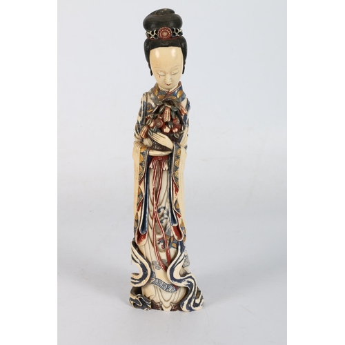 419 - Chinese early 20th century polychrome carved and painted ivory figure of Quan Yin holding a basket o... 