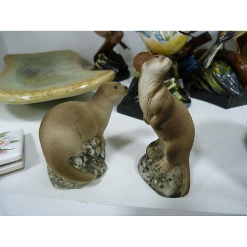 105 - Collection of bird figures including owls, modern art plaque, modern bowls, otter figures, basket, c... 