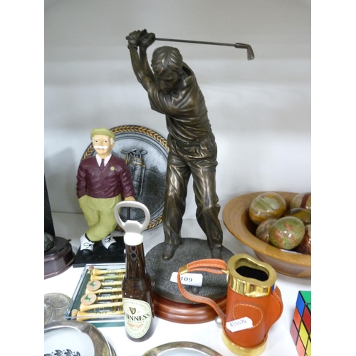 109 - Collection of modern golfing figures and related items, including a golf bag and shoes, boxed set of... 