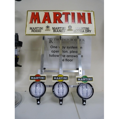 111 - Three optics, including Bells Scotch Whisky and another labelled for Hennessey Cognac.