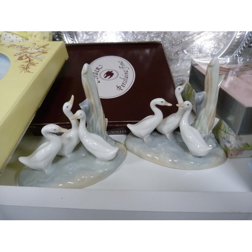 112 - Two Nao bird groups, Border collector's plates, china-headed dolls, green enamel pot and cover, mode... 