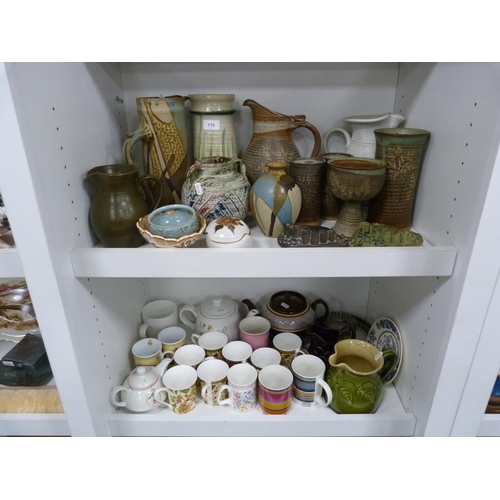 115 - Collection of art pottery including vases, some marked to the underside, German-style jugs, modern m... 