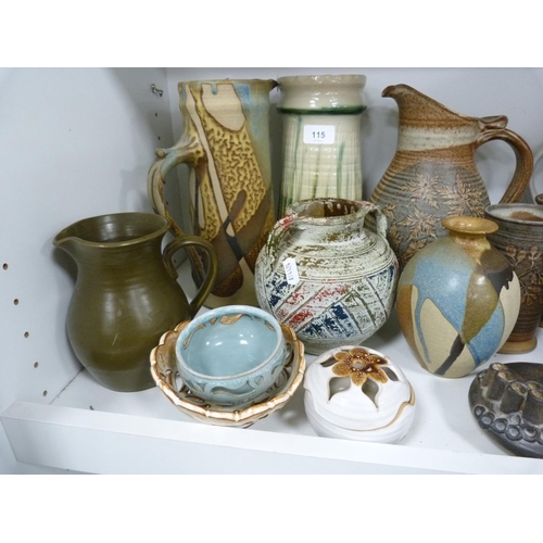 115 - Collection of art pottery including vases, some marked to the underside, German-style jugs, modern m... 