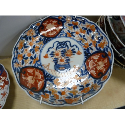 158 - Twelve assorted late 19th/early 20th century Japanese Imari plates.