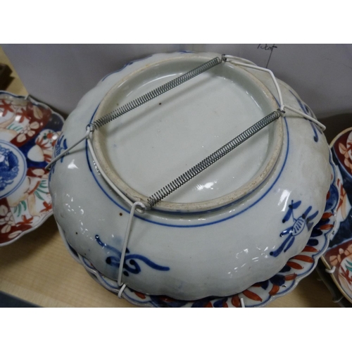 158 - Twelve assorted late 19th/early 20th century Japanese Imari plates.