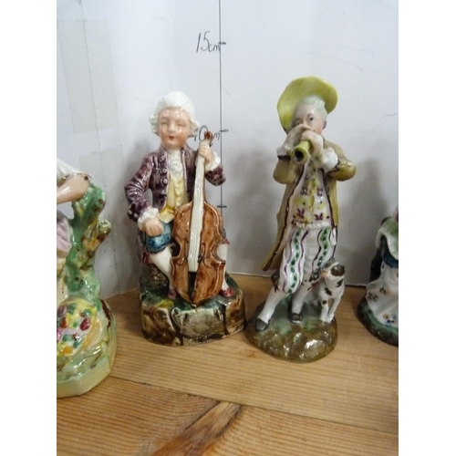 173 - Assorted early 20th century continental porcelain figure modelled as male and female musicians, figu... 
