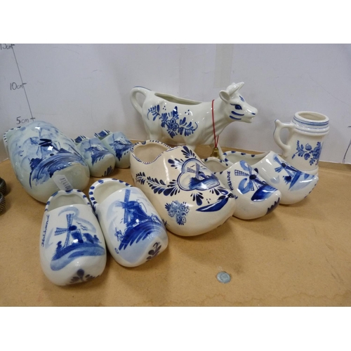 184 - Collection of Delft-style china including clogs, cow creamer, Caithness-style glass vase, amber-colo... 