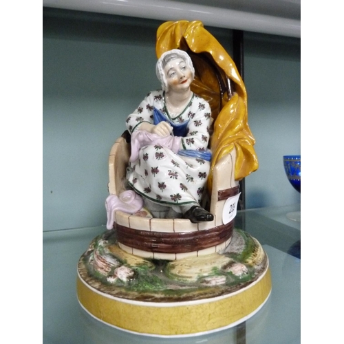 209 - Meissen-style porcelain figure group modelled as a seated lady sewing (a/f).