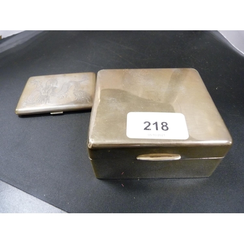 218 - Silver cigarette box and a silver cigarette case decorated with an etched dragon.