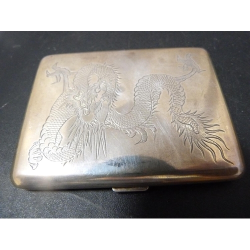 218 - Silver cigarette box and a silver cigarette case decorated with an etched dragon.