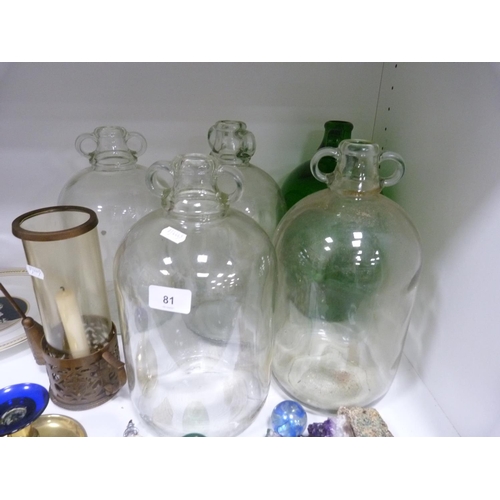 81 - Five glass wine flagons, brass candlesticks, brass chamberstick, mineral eggs, Paragon commemorative... 