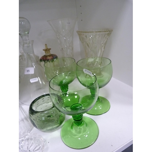 85 - Decanters, green glasses, perfume bottle with stopper, jug, ashtray, green glass float, spare decant... 