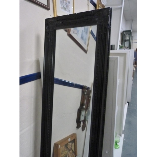 86 - Ebonised wall mirror and a gilt wall mirror.