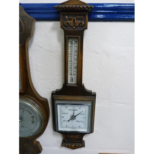 88 - Two 1930s oak wall barometers.