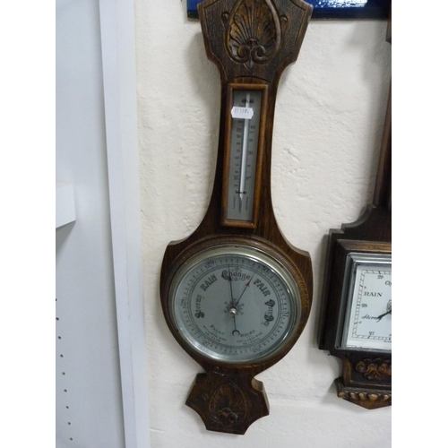 88 - Two 1930s oak wall barometers.