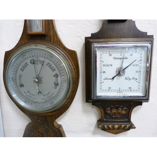 88 - Two 1930s oak wall barometers.