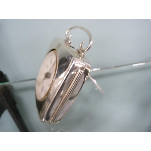 223 - Silver-mounted desk clock with quartz movement, by Walker & Hall, Sheffield, on an easel support... 