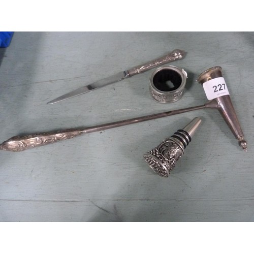 227 - Candle snuffer with silver handle, letter knife, bottle stopper etc.&nbsp; (4)