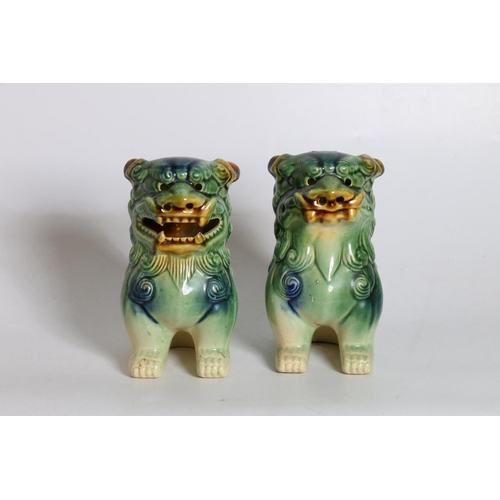 18 - Pair of oriental lion dogs.