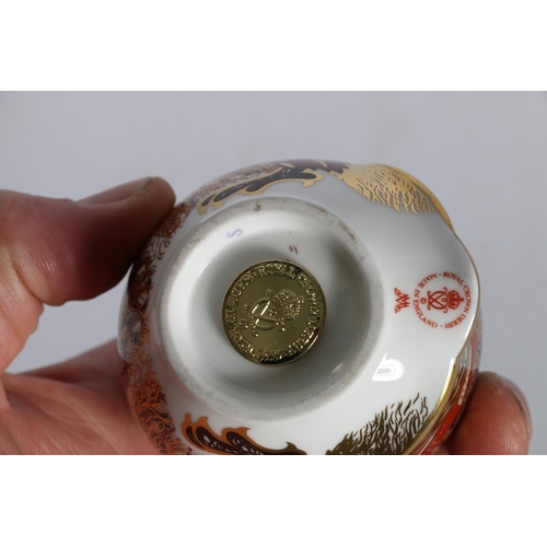 29 - Royal Crown Derby porcelain paperweight in the form of an owl, 8cm tall.