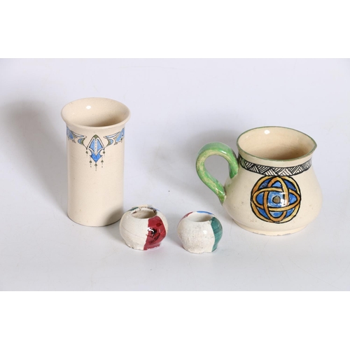 43 - Holyrood Pottery jug with Celtic Knot decoration, signed to base with initials M.D.R., 8cm tall, a H... 