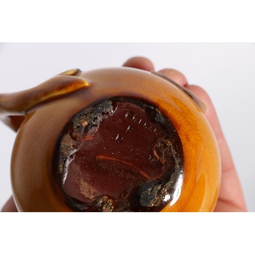 46 - C.H. Brannam Pottery yellow glaze jug, 9cm tall and another. (2) (a/f)