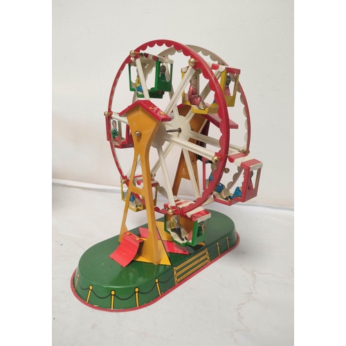 33 - Three German vintage mechanical clockwork circus themed tin toys by Josef Wagner to include a ferris... 