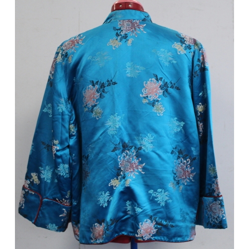 463 - Vintage Chinese lady's jacket in turquoise floral brocade with red piping, retailed by Debenham and ... 