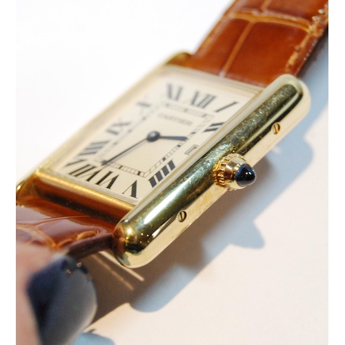 127 - Cartier 18ct gold Tank wristwatch, quartz, with date, 460442WX 2441, on strap with Cartier 18ct gold... 