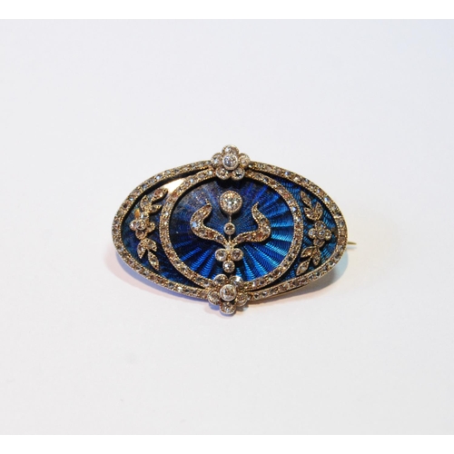 132 - Victorian gold oval brooch with ovals, sprays and collets of rose and brilliant diamonds upon blue g... 