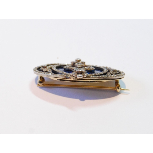 132 - Victorian gold oval brooch with ovals, sprays and collets of rose and brilliant diamonds upon blue g... 