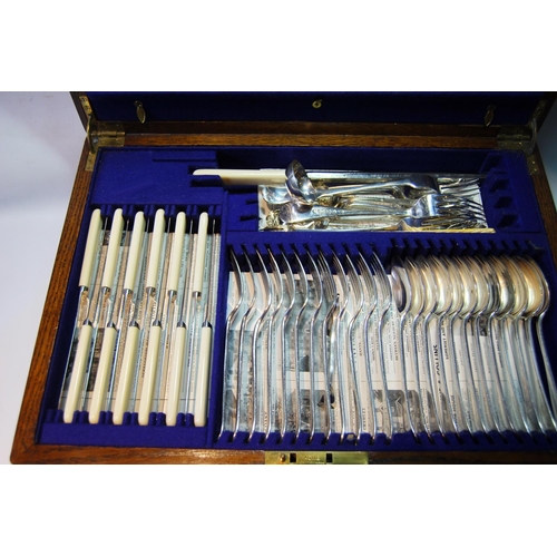 142 - Oak canteen with Old English pattern flatware and cutlery, and other flatware and cutlery.