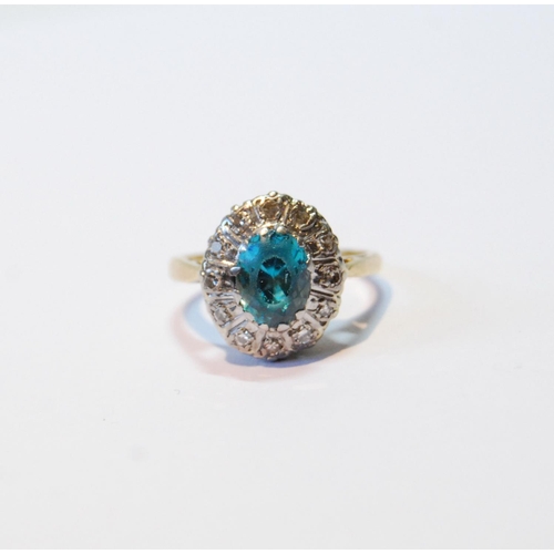 145 - Blue zircon and diamond oval cluster ring, '18ct pt', size K.