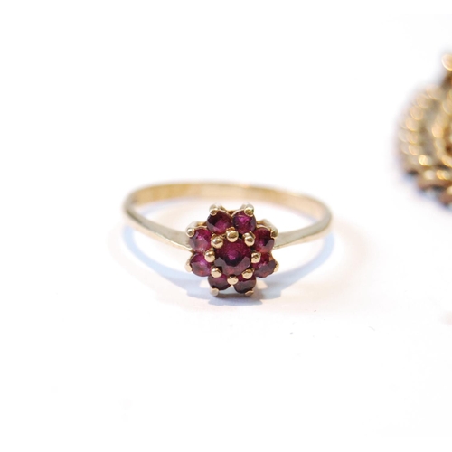 146 - Garnet cluster ring in 9ct gold, and a metal albert chain.  (2)