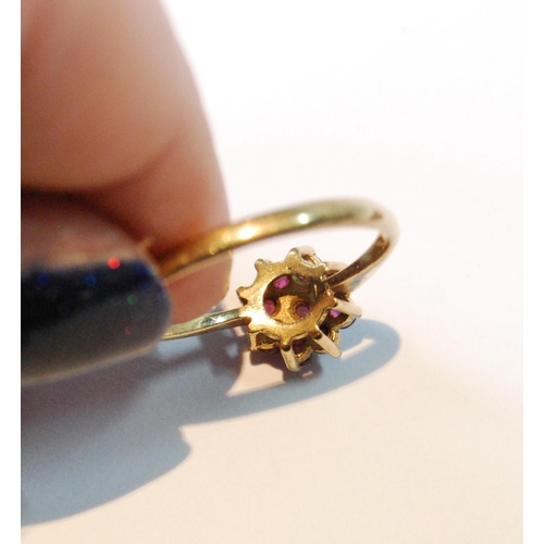 146 - Garnet cluster ring in 9ct gold, and a metal albert chain.  (2)