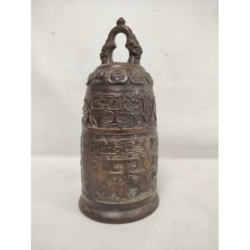 136 - Chinese Qing dynasty bronze temple bell cast in archaic style, 29cm high.