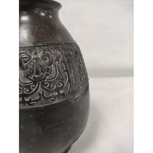 141 - Chinese Qing dynasty bronze ovoid jar with archaised  decoration, 23cm high.