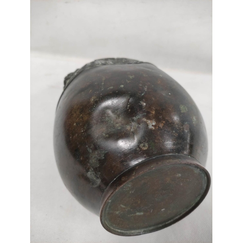 141 - Chinese Qing dynasty bronze ovoid jar with archaised  decoration, 23cm high.