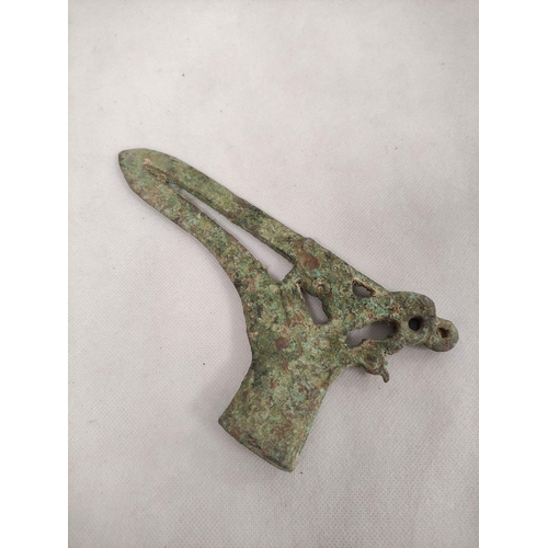 142 - Early Chinese bronze halberd and a bronze ceremonial sword blade.  (2).